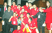 Egypt players and officials celebrate with the Zone V title on Sunday. (Photo / G. Barya)
