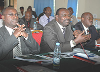 Governor of Central Bank Francois Kanimba and Director General SSFR at the launch of the findings at La pallise Hotel. (Photo/ G.Barya).