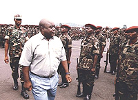 Laurent Kabila inspecting his troops in 1997.