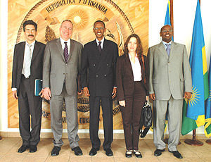 President Kagame with the IMF team led by Mark Plant,Dimitry Gershenson (L) and Murgasova. Also present was the Minister of Finance, James MUSONI.
