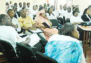 Participants listening at the workshop organised by Intra Health yesterday. (Photo / G.Barya)