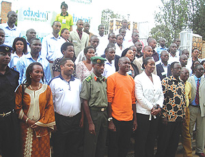 First Lady Jeannette Kagame poses for a group photo with participants at the launch of the 2009 YEWs. (Photo /PNtambara).