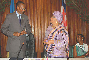 President Kagame is congratulated by President Johnson Sirleaf after receiving Liberiau2019s highest state honour. (PPU Photo)
