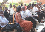 Some of the fired Rwandatel workers camp in front of CESTRAR offices in Kacyiru to contest their sacking yesterday. (Photo/ G. Barya)