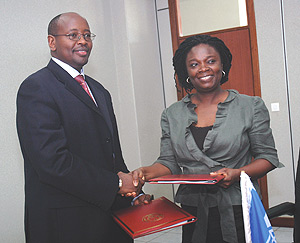 Finance Minister James Musoni and World Bank country  representative Victoria Kwakwa.(Photo/ G. Barya).