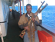 A Somali pirate on board a cargo ship.