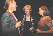 Jhpiego boss Leslie Mancuso (C) chats with some of the partners during a dinner on Monday. (Photo/ G. Barya).