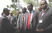 Premier Bernard Makuza  greets delegates as he arrived for the ICT forum yesterday. (Photo/ G. Barya).