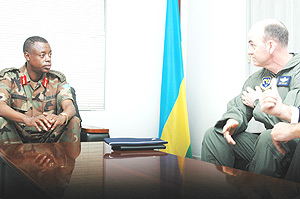The Chief of Defence Staff, General James Kabarebe  having talks with Brig Gen Michael Callan yesterday. (Photo GBarya).