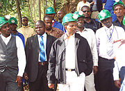 Minister of Mines and Natural resources, Vincent Karega and some of the miners at Kirehe mine.
