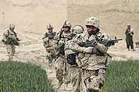 Canadian soldiers from the NATO-led coalition patrol a village in the Taliban stronghold of Arghandab district in Kandahar province, southern Afghanistan.