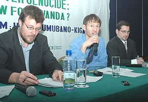 (L-R): Dr. Phil Clark, Andrew Wallis and Zachary D Kaufman at the launch of the book yesterday. (Photo / G.Barya).