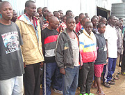 The excombatants in a group photo at Mutobo.