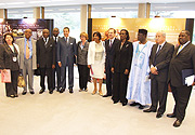 Some of the  Ambassadors who attended the commemoration ceremony pose before the exhibition with the UN Geneva Director General Mr. Sergei Ordhonkidze, the UN High Commissioner Human Rights Ms Navenethem Pillay and Rwandau2019s  Ambassador Mme Venetia Sebudan