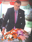 US Ambassador Stuart Symington laying a wreath at the memorial plaque at the Embassy gardens yesterday. (Photo/ G. Barya).