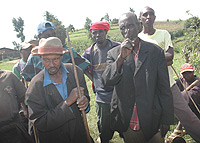 Two old men tell Bisesero sad story.