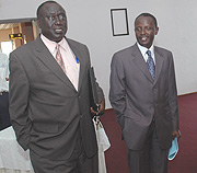 Justice Minister Tharcise Karugarama (L) and Prosecutor General Martin Ngoga arrive for the meeting yesterday. (Photo/ J. Mbanda).