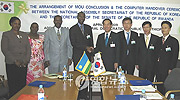 Senate PS Sosthene Cyitatire (4th L) shaking hands with his South Korean counterpart after the signing. (Courtsey photo).