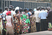 REMEMBERING THE DEAD: Visitors to the Kigali Genocide Memorial checking the names of the victims, who were killed during the 1994 Genocide against Tutsis. (Photo / G. Barya).