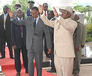 President Paul Kagame and his Ugandan counterpart, Yoweri Museveni , at Entebbe in Uganda. (Courtesy Photo).