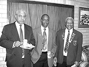 VIP POSE: RCAu2019s Charles Haba (C) posing for a photo with ICC officials on National cricket teamu2019s tour of South Africa. (File photo)