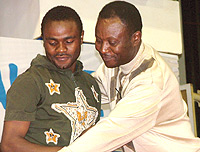 TWO WRONGS DONu2019T MAKE A RIGHT:  Rayon Sport coach Raoul Shungu (R) shares a moment with striker Abedi Mulenda. Shungu is under-fire for his role in signing expensive flops. He tapped Mulenda from Atraco, something that landed the striker in trouble with F