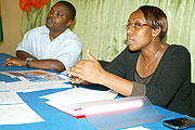 Gasabo Mayor Claudine Nyinawagaga, flanked by John Rukabu during the interview yesterday. (Photo G Barya).