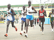 The Kigali International Marathon attracts some of the best regional athletes like  Kenyau2019s Daniel Rotich (centre) who won the full marathon in 2007. (File photo).