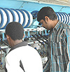 UTEXRWA workers monitoring the rilling machines. (File photo).