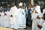 Archbishop Thaddeus Ntihinyurwa (C) at a chirch service at St Michel Cathedral recently (File Photo)