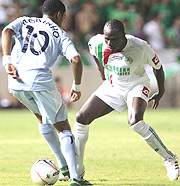 Rwandau2019s Hamad Ndikumana comes against Manchester Cityu2019s Robinho in last yearu2019s Uefa Cup tie.