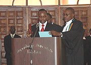 Alloys Mutabingwa taking oath following his appointment as EAC Deputy Secretary General at the Summit in Arusha. (PPU Photo).
