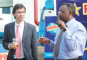Fred Nyagezi, the Marketing Manager  of Bralirwa and  Alexander Koch Commercial Manager on Thursday. (Photo / G. Barya).