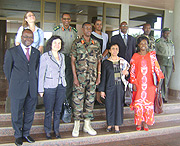 Gen. James Kabarebe and Ines Alberdi  with other officials pose for a photo after their meeting at MINADEF headquarters on Wednesday. (Photo/ R. Mugabe).