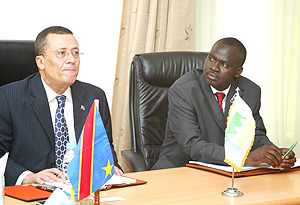 DRC Minister Jose B .Endundo with Environment and Natural Resources Minister, Stanislas Kamanzi, addressing members of the press yesterday. (Photo/ G.Barya).