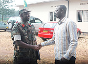 Col. Firmin  Bayingana greets a friend recently. (File Photo).