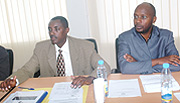 CNLG boss Jean de Dieu Mucyo (L) and Robert Masozera of the Diaspora Directorate during the meeting yesterday.(Photo / J. Mbanda).