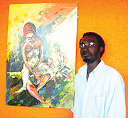Morris Munyanah displays one of his painting.