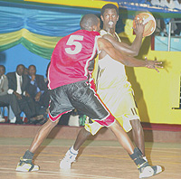 Former Marine captain Fiston Muhire (with the ball) weighed in 15 points for CSK. (File photo).