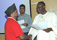 COC: Salim Abdulgani (Center). RAC president Dismas Kayibanda congratulates  two-time African champion Muna Singh back in 2007. (File photo)