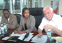 George Mulamula (left) during a recent RDB press briefing. On the right is Joe Ritchie the RDB CEO (File Photo)