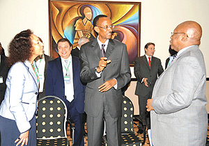 President Kagame shares a light moment with AfDB Vice President, Zeinab El Bakri (L) and Abdoulie Janneh from UNECA yesterday. This was after the opening of the African Ministerial Conference on Climate Change in Kigali. (Photo/ G. Barya).