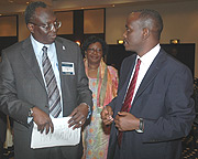 WHO Country Representative Dr Abdoulie D. Jack (L) listens to Health Minister Dr Richard Sezibera as UNFPA Country Representative Therese Zeba looks on. This was during the Maternal and Child death prevention meeting yesterday. (Photo/ J Mbanda).