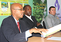 Ferwacy president Aimable Bayingana stressing a point during yesterdayu2019s press conference at Amahoro Stadium as Minispoc Permanent Secretary Jean Pierre Karabaranga and GSOu2019s Olivier Grandjean look on. (Photo by G.Barya)