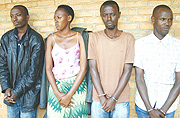 Emmanuel Dusingizimana, Josu00e9lyne Kayitesi, Kamuhanda and Uwizeyimana at Kicukiro Police post Yesterday. The quartet is accused of murder. (Photo GBarya).