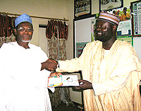 Dr. Tajudeen Abdul - Raheem with a collegue.