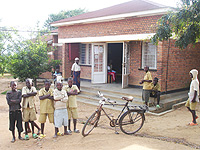 A few local schoolboys outside the Mayange Health Centre