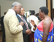 The Minister of education Daphrose Gahakwa chatting with the Headteacher of Lycee de Kigali Martin Masabo and Camille Rudasingwa  from St Aloys Rwamagana yesterday. (Photo/ G.Barya).