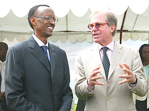 President Kagame listens as Professor Nicholas Negroponte, Chairman OLPC, makes a point. (Photo/ G. Barya).