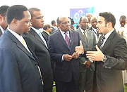 L-R: Jean Claude Nsengiyumva, the EAC Deputy Secretary General (Productive and Social Sectors), William Ngeleja, Tanzaniau2019s Minister for Energy and Minerals and Reginald Mengi,Chairman, East African Business Council listens to an energy investor during th